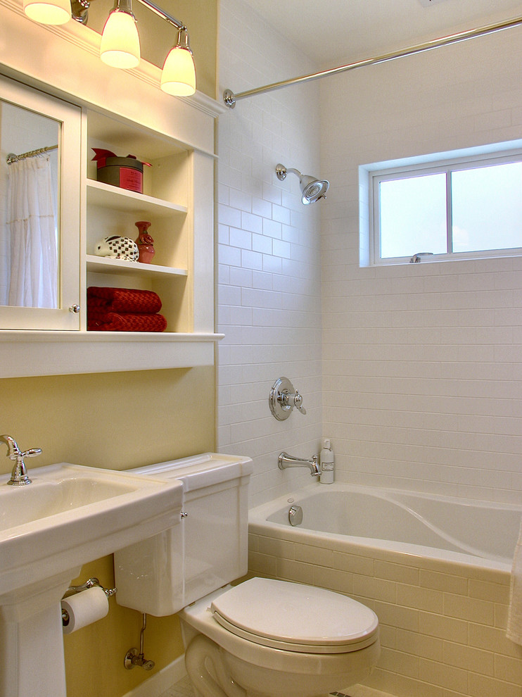 Inspiration for a small traditional bathroom in Seattle with a pedestal sink and subway tile.