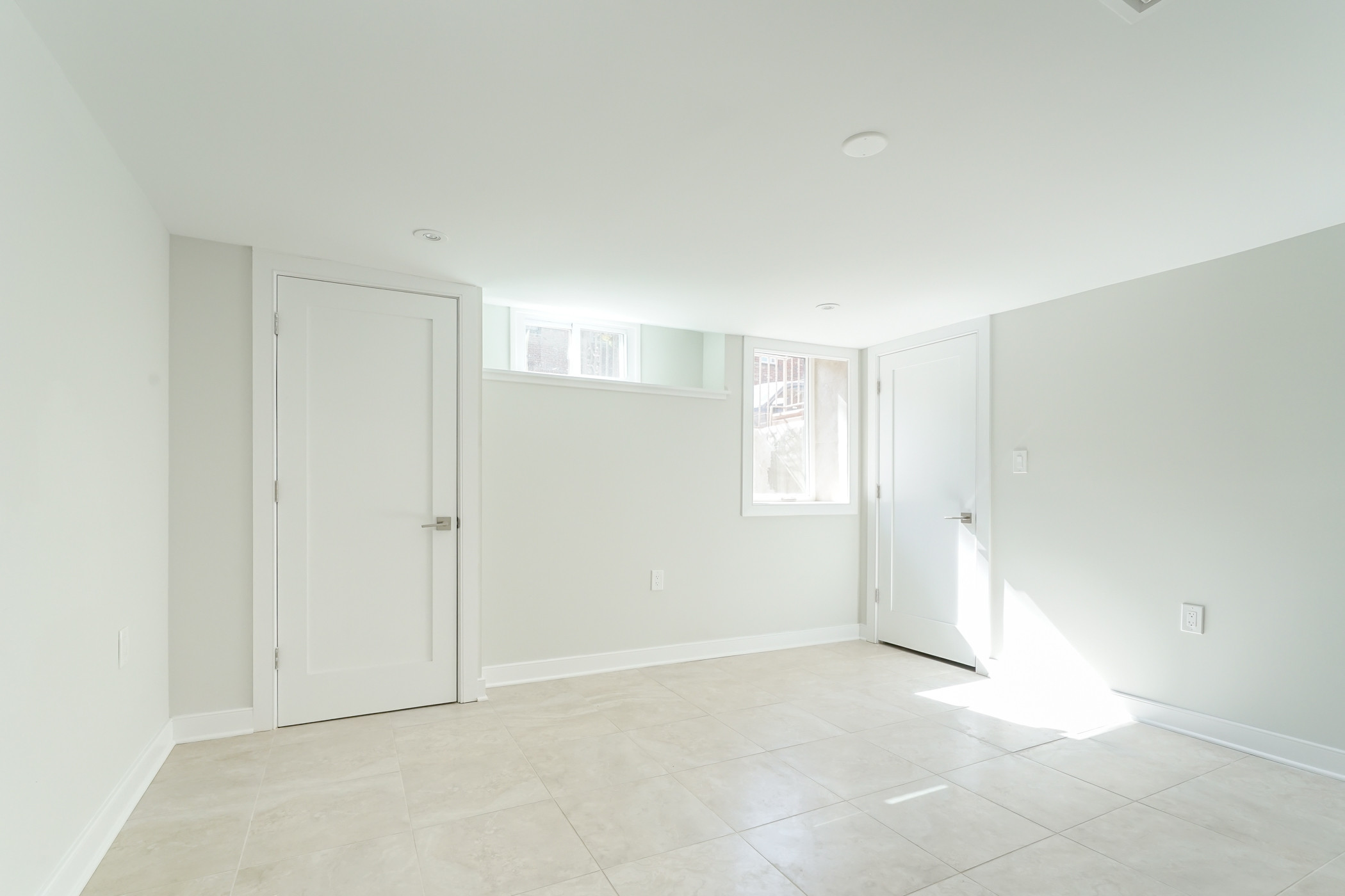 Finished lower level bedroom with en suite