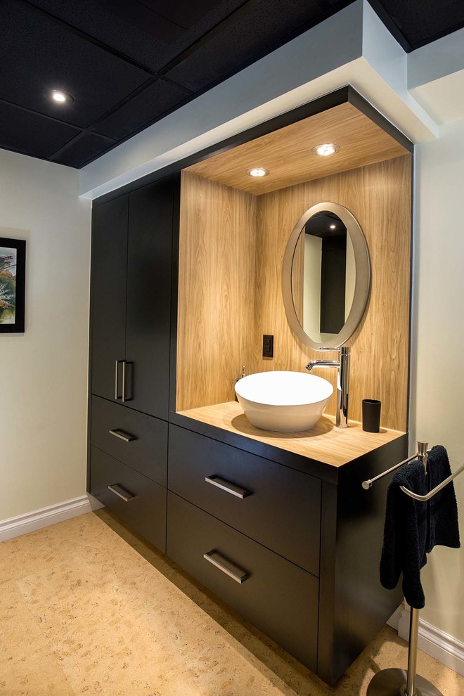 Small contemporary 3/4 bathroom in Montreal with flat-panel cabinets, brown cabinets, beige tile, white walls, cork floors, a vessel sink and laminate benchtops.