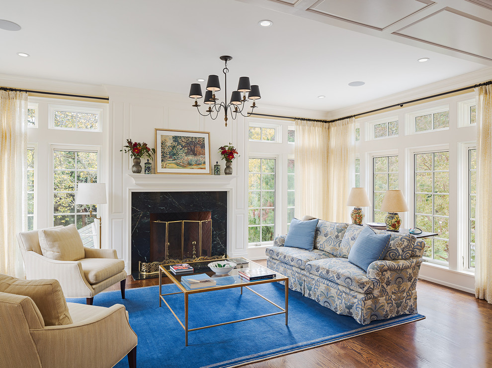 Design ideas for a mid-sized traditional sunroom in Philadelphia with medium hardwood floors, a standard fireplace, a stone fireplace surround and a standard ceiling.
