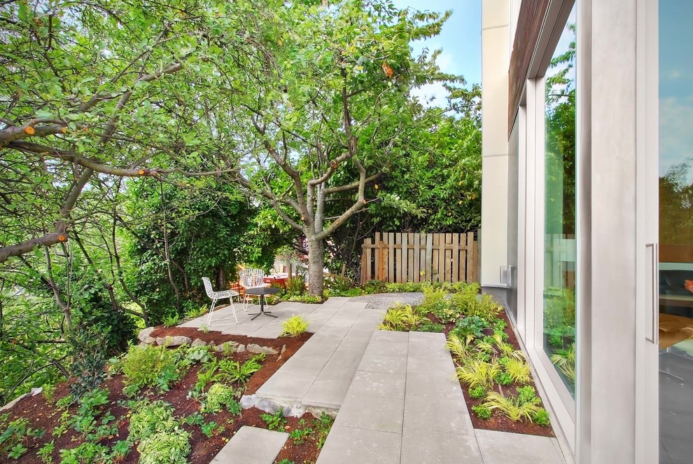 This is an example of a contemporary patio in Seattle with no cover.