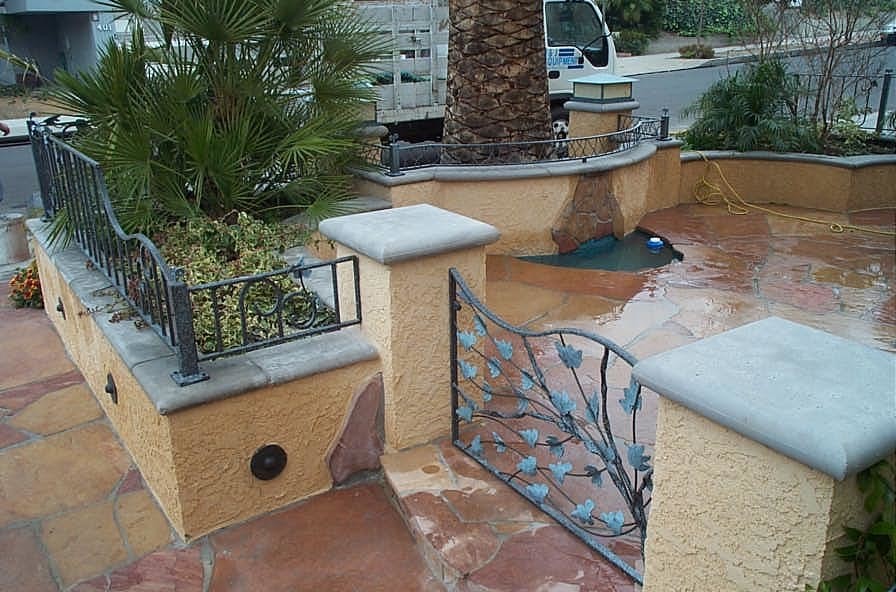Court with water features and crained in to location specimen palm.