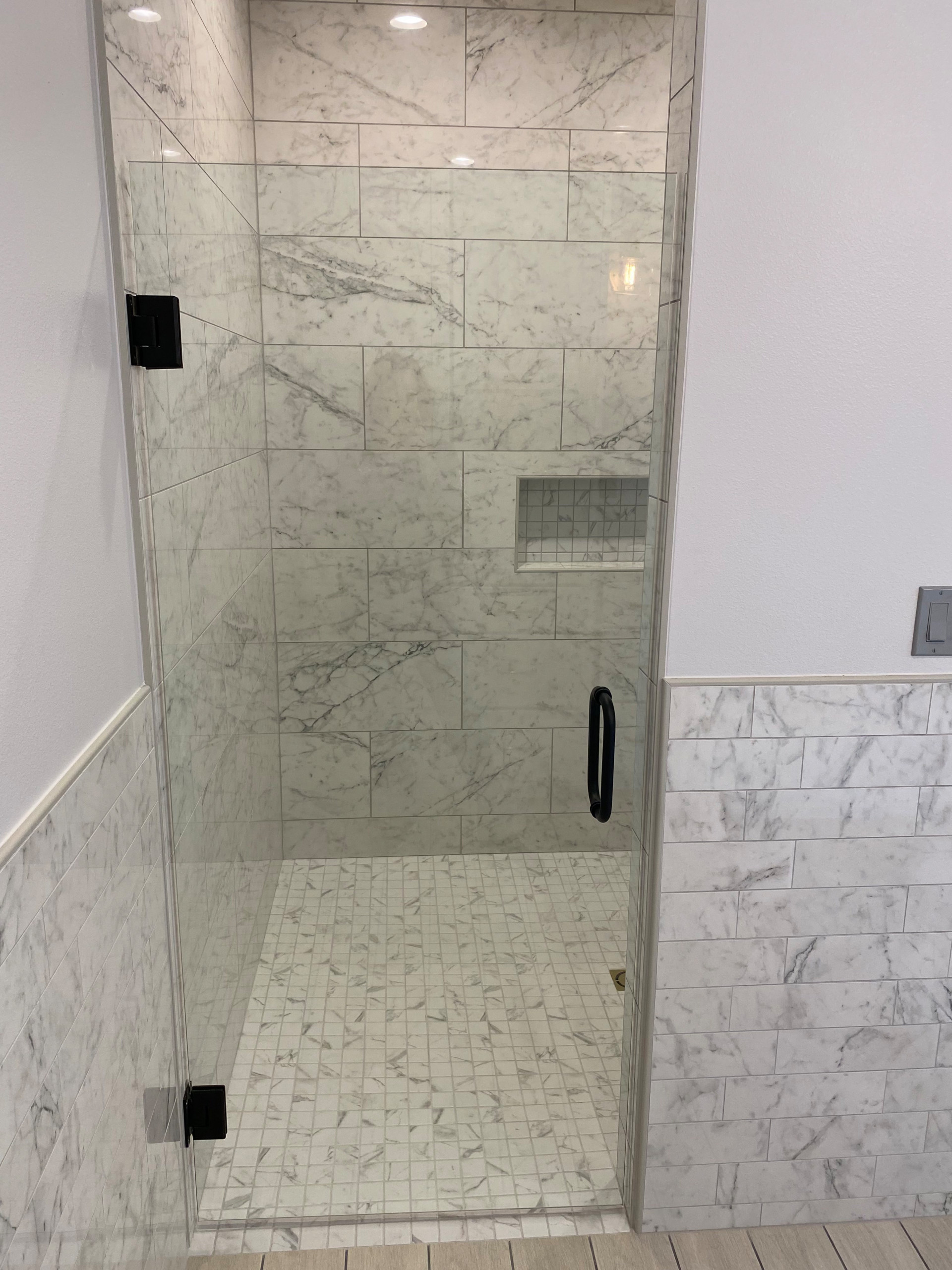 Master bath custom tile shower with glass shower door