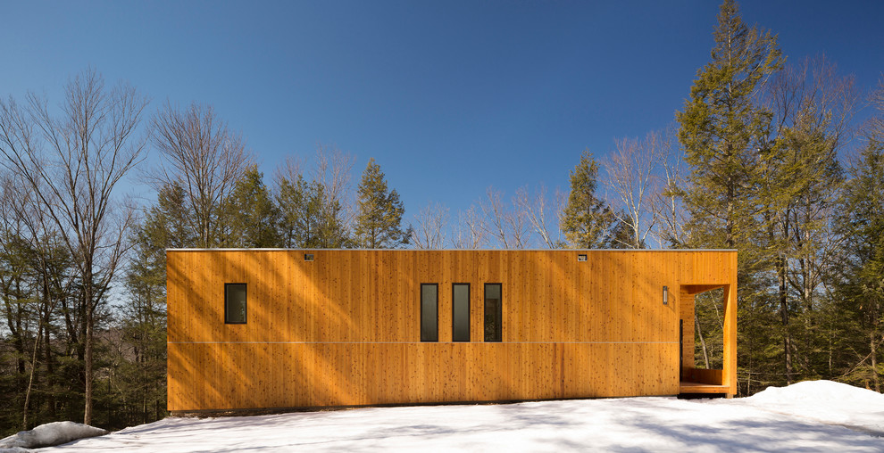 Inspiration for a contemporary exterior in New York with wood siding.