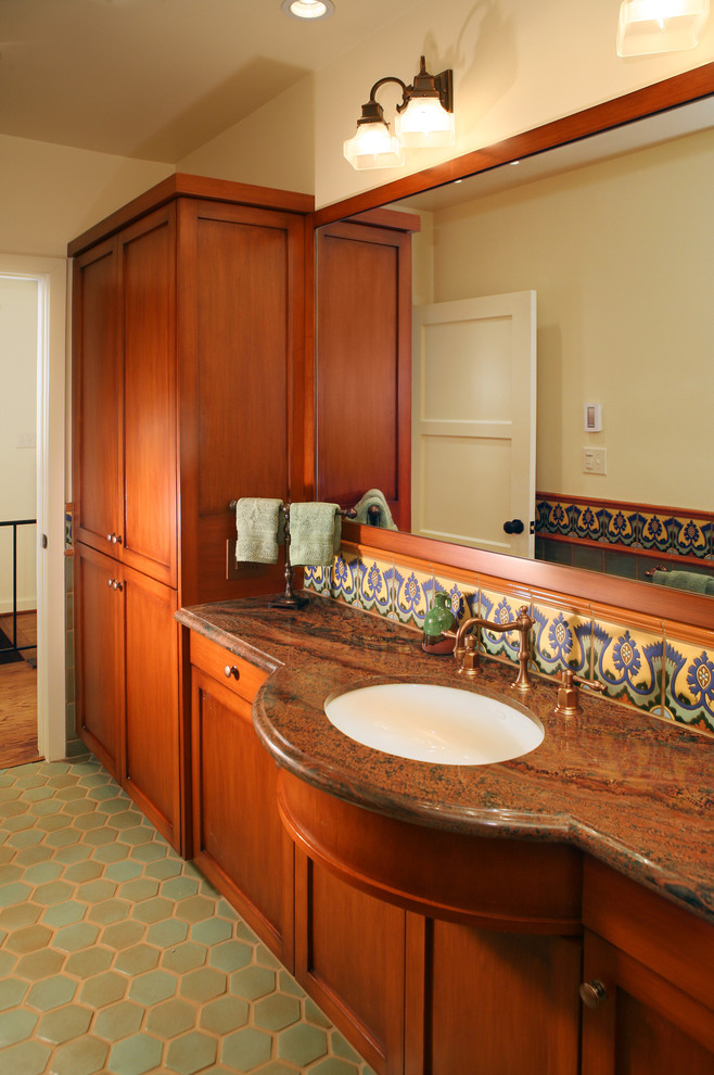 Design ideas for a mediterranean bathroom in Los Angeles with shaker cabinets.