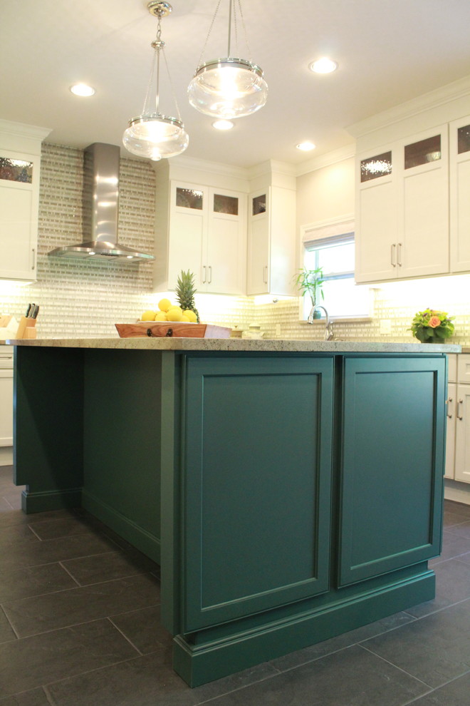 Mid-sized transitional u-shaped open concept kitchen photo with recessed-panel cabinets, green cabinets, stainless steel appliances and an island