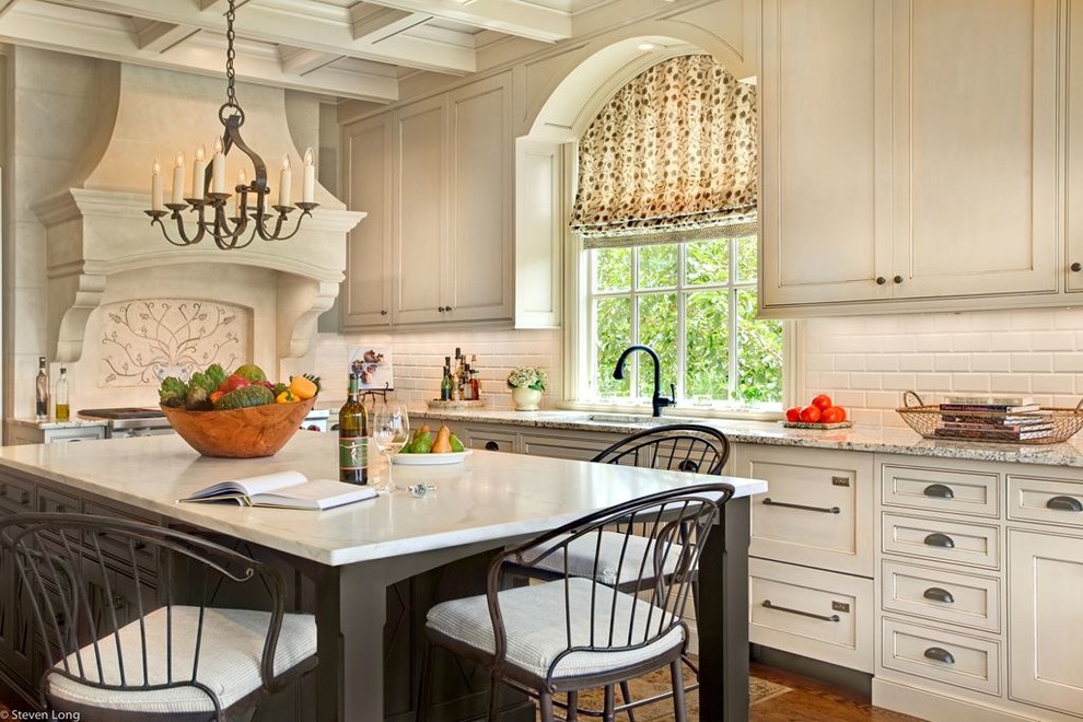 Example of a transitional kitchen design in Denver