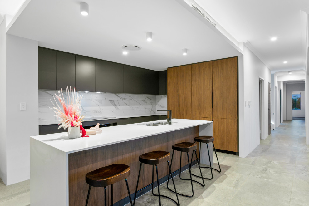 Large contemporary galley kitchen pantry in Perth with an undermount sink, black cabinets, quartz benchtops, white splashback, marble splashback, porcelain floors, with island, grey floor and white benchtop.