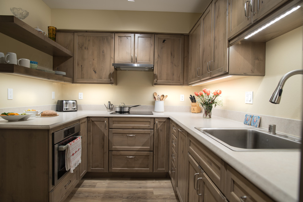 Inspiration for a transitional kitchen remodel in Seattle with yellow walls