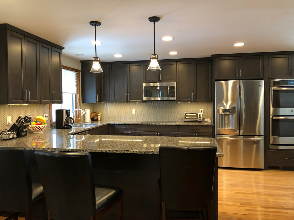 Example of a transitional kitchen design in Seattle