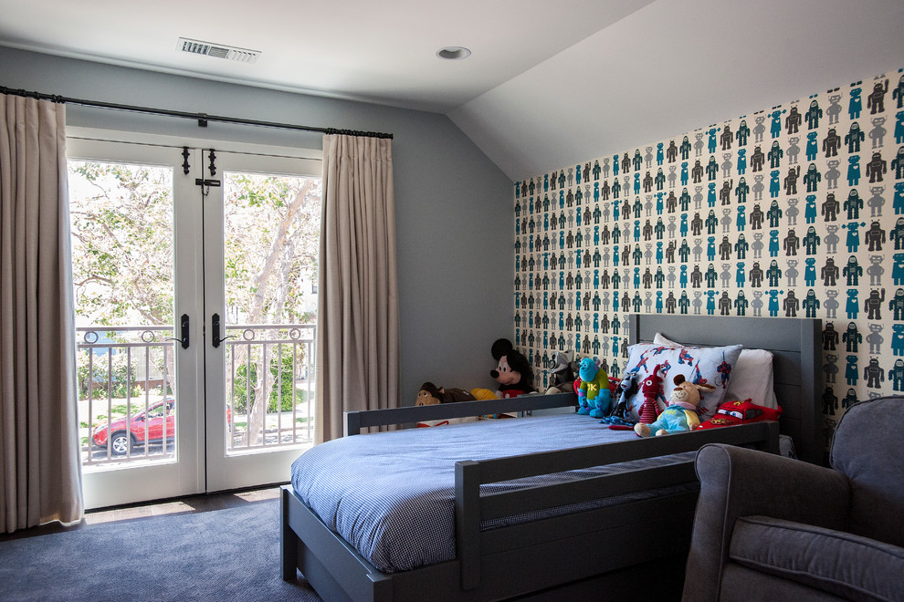 Mid-sized transitional kids' bedroom in Los Angeles with blue walls for kids 4-10 years old and boys.