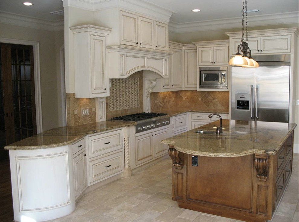 Design ideas for a large traditional l-shaped kitchen in Houston with an undermount sink, raised-panel cabinets, beige cabinets, granite benchtops, brown splashback, porcelain splashback, stainless steel appliances, porcelain floors, with island, beige floor and brown benchtop.