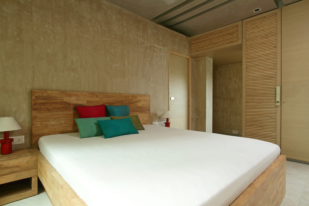 This is an example of a contemporary bedroom in Pune.