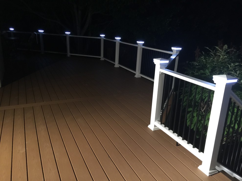 Mid-sized traditional backyard deck in New York with no cover.