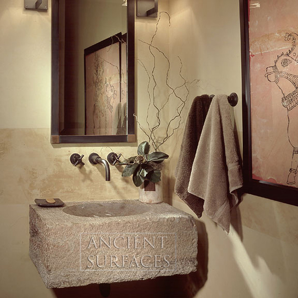 Example of a tuscan powder room design in New York