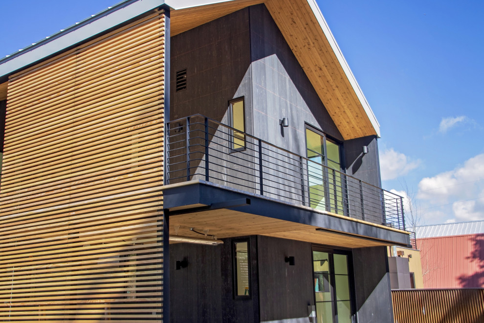 Example of a backyard privacy deck design with a roof extension