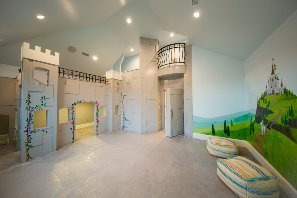 This is an example of a large transitional gender-neutral kids' playroom for kids 4-10 years old in Salt Lake City with multi-coloured walls and carpet.