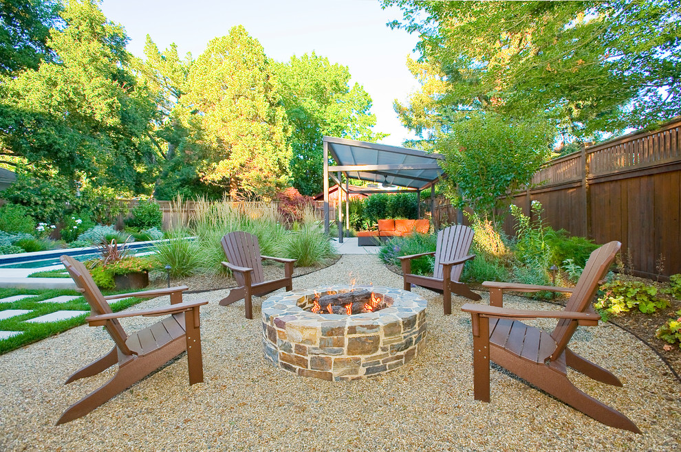 Design ideas for a contemporary backyard patio in San Francisco with a fire feature.