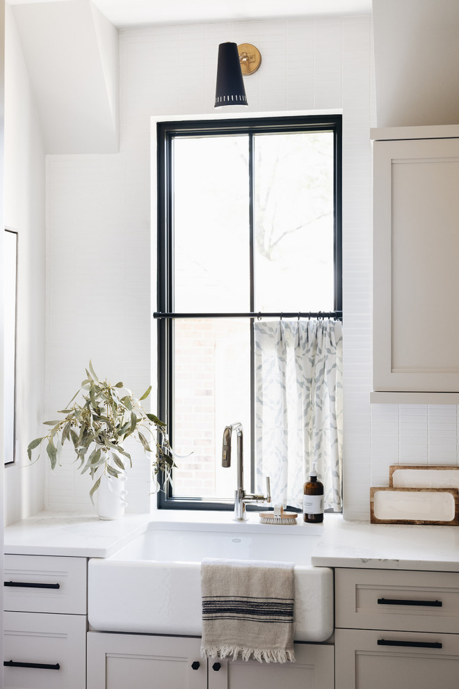 Transitional laundry room photo in Chicago