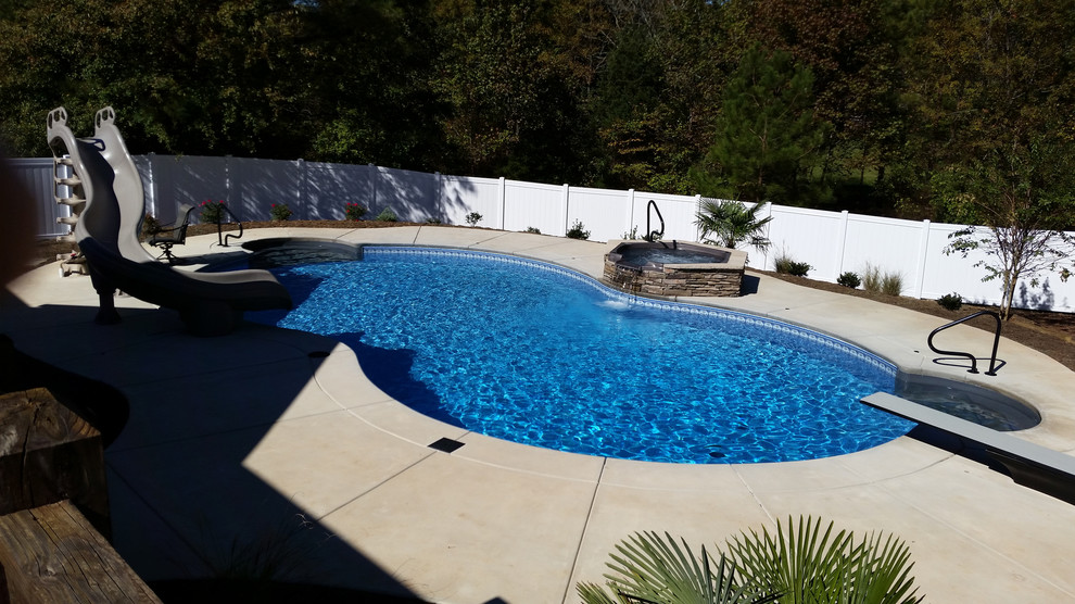 This is an example of a contemporary pool in Charlotte.
