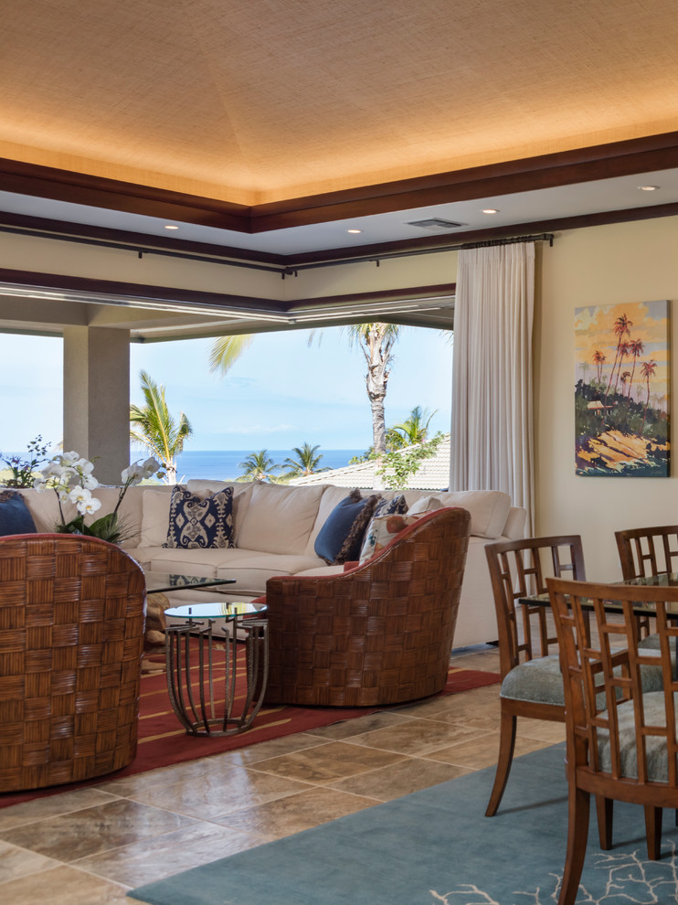 Mid-sized tropical kitchen/dining combo in Hawaii with beige walls, carpet, no fireplace and blue floor.