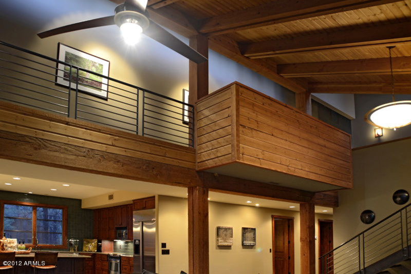 Home design - mid-sized rustic home design idea with no cover
