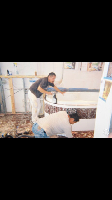 Spa Tub in Marble & Teak Trim