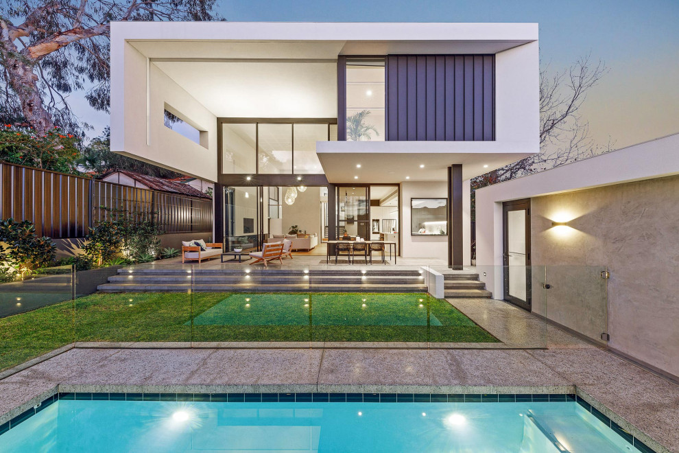 This is an example of a contemporary rear house exterior in Perth.