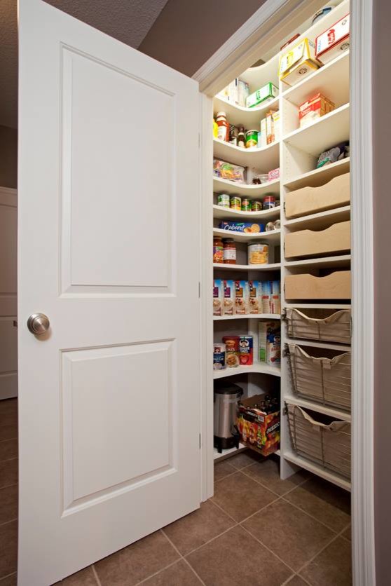 Inspiration for a small traditional l-shaped kitchen pantry in Minneapolis with open cabinets and white cabinets.