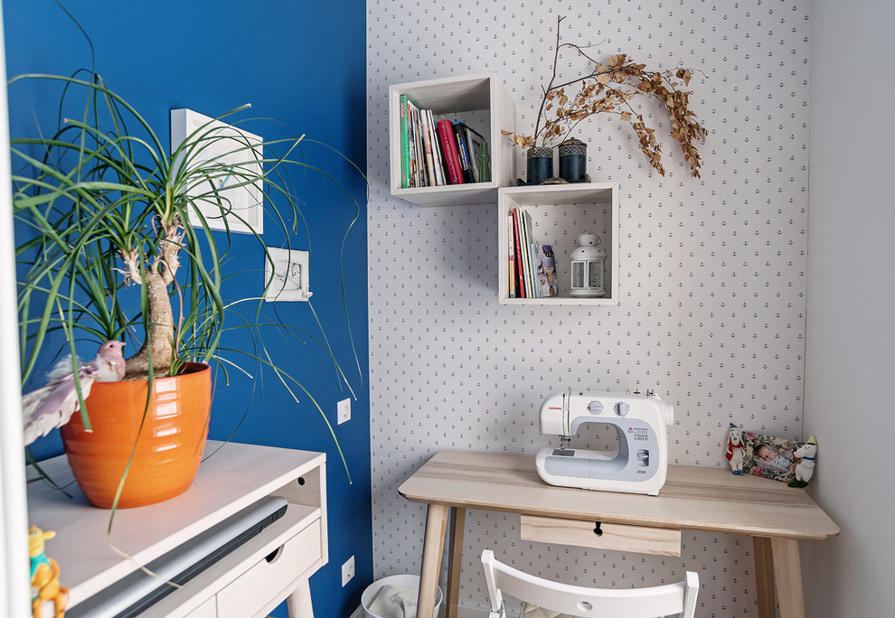 Design ideas for a small scandinavian craft room in Yekaterinburg with multi-coloured walls and a freestanding desk.