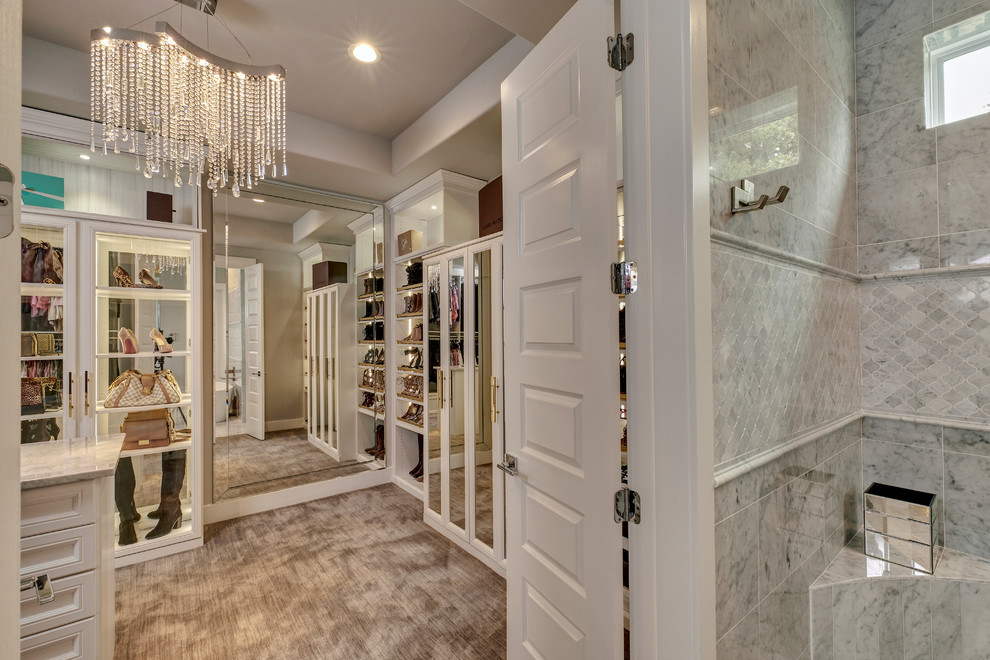 This is an example of a transitional storage and wardrobe in Austin.