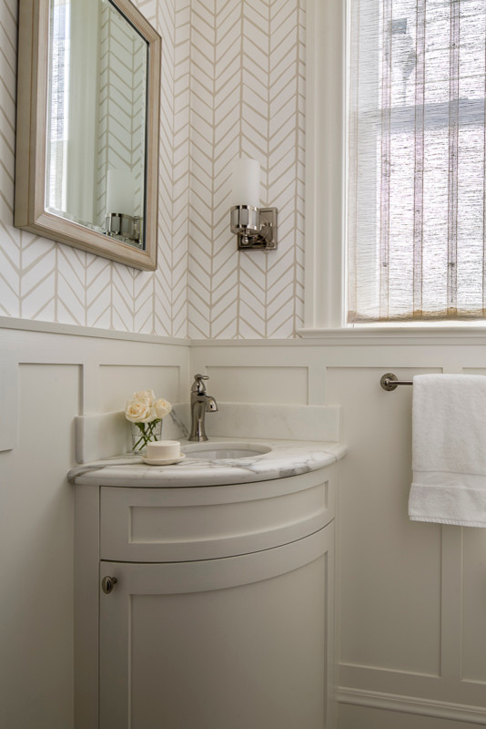 Design ideas for a mid-sized traditional powder room in San Francisco with shaker cabinets, beige cabinets, white walls, an undermount sink, marble benchtops and white benchtops.