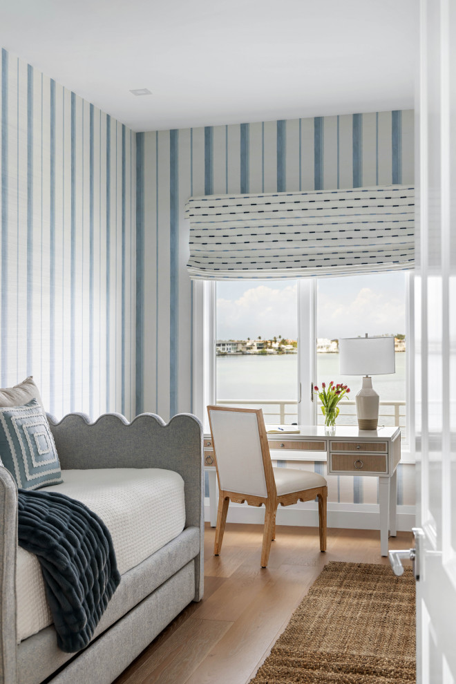 Example of a beach style home design design in Tampa