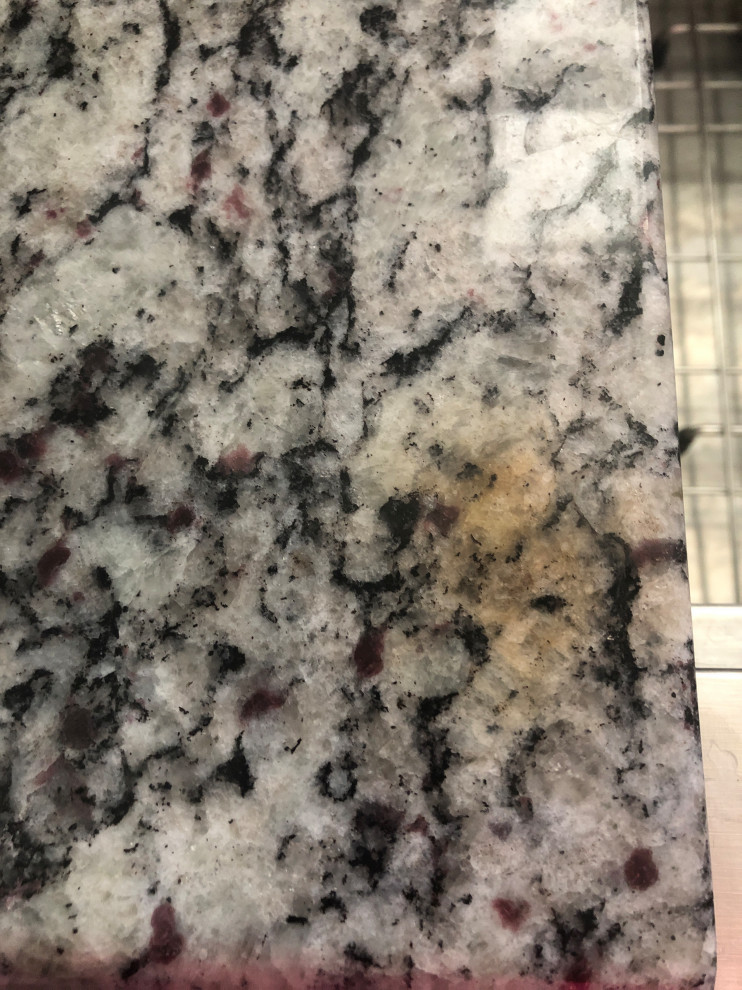 Brown Spot on Granite