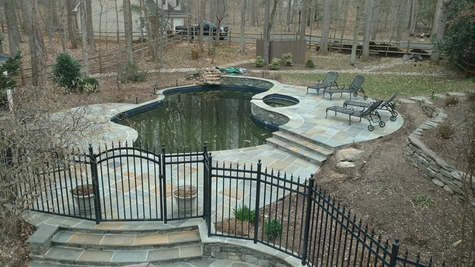 Pool - huge transitional backyard stone and kidney-shaped natural pool idea