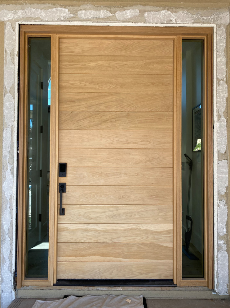 White oak entry door with insulated clear glass