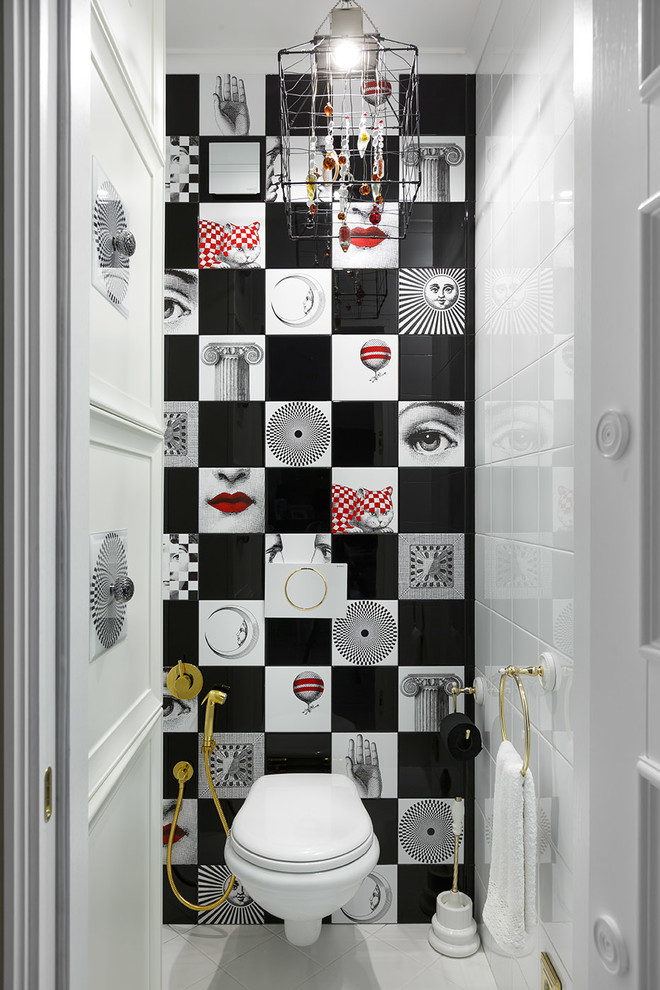 Small eclectic powder room in Saint Petersburg with a wall-mount toilet and black and white tile.