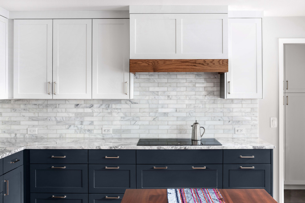 Eat-in kitchen - large transitional u-shaped medium tone wood floor and brown floor eat-in kitchen idea in Austin with a single-bowl sink, shaker cabinets, blue cabinets, quartzite countertops, gray backsplash, marble backsplash, stainless steel appliances, no island and gray countertops