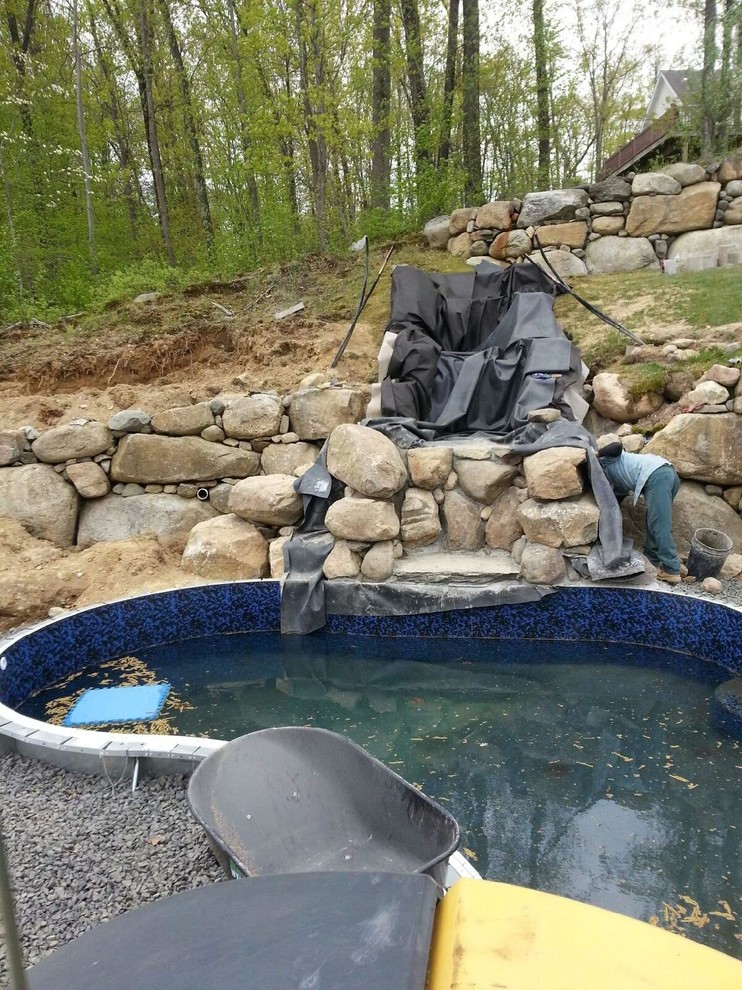 pool with natural bluestone patio natural waterfall and landscape