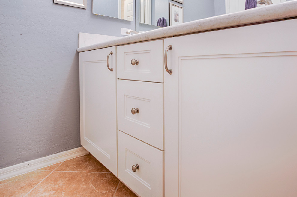 Inspiration for a mid-sized transitional 3/4 bathroom remodel in Phoenix with recessed-panel cabinets, white cabinets and granite countertops