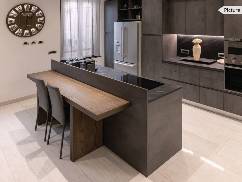 Design ideas for a large modern galley eat-in kitchen in Milan with a drop-in sink, flat-panel cabinets, grey cabinets, grey splashback, stainless steel appliances, porcelain floors, with island, beige floor, grey benchtop and recessed.
