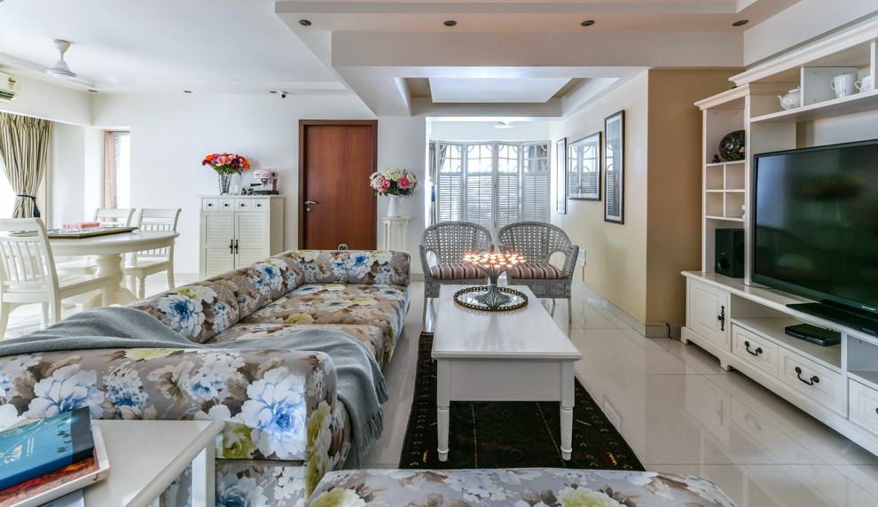 Photo of a transitional living room in Mumbai.