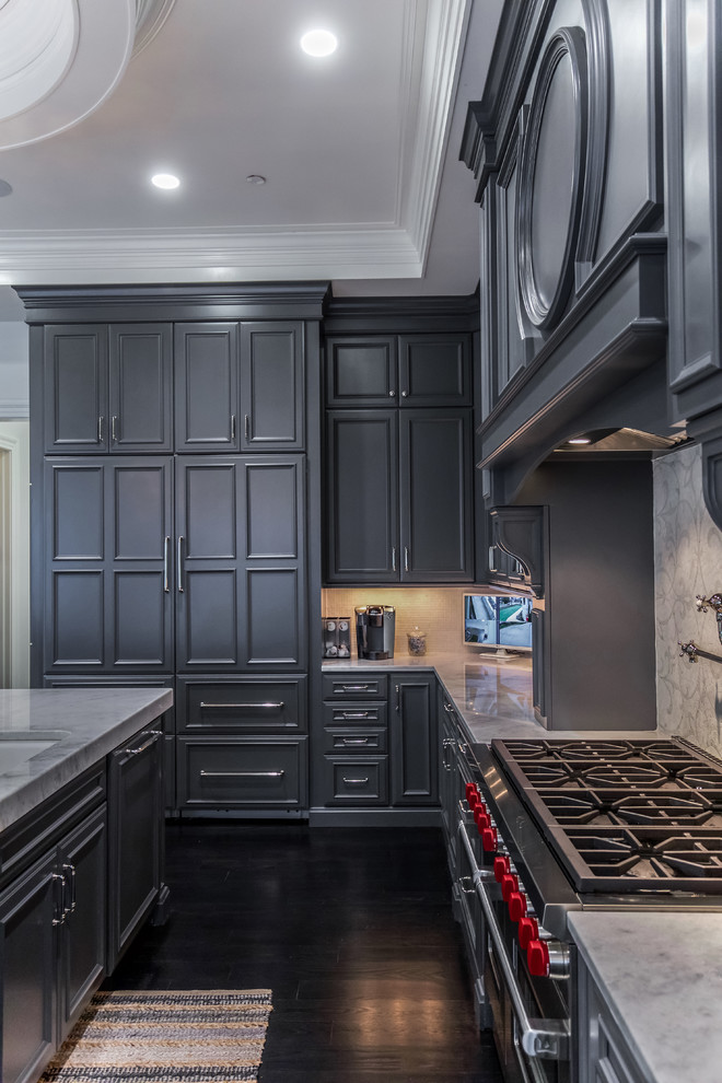 Example of a large transitional l-shaped dark wood floor eat-in kitchen design in DC Metro with beaded inset cabinets, gray cabinets, stainless steel appliances and an island