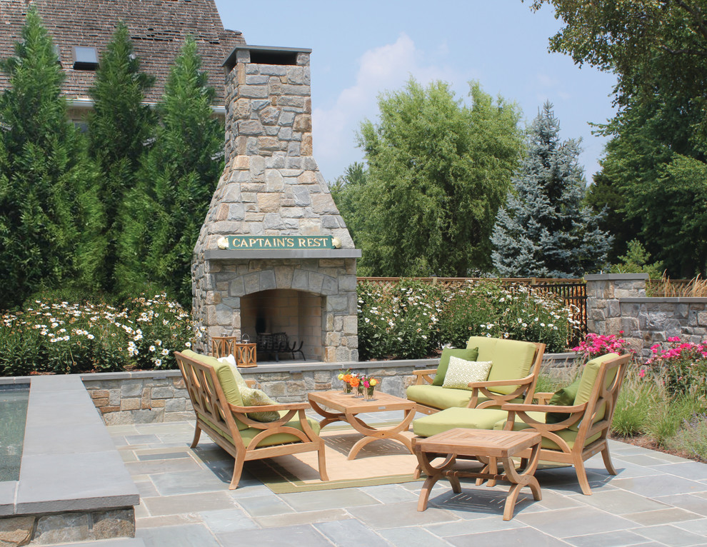 Inspiration for a traditional patio in Baltimore with a fire feature.