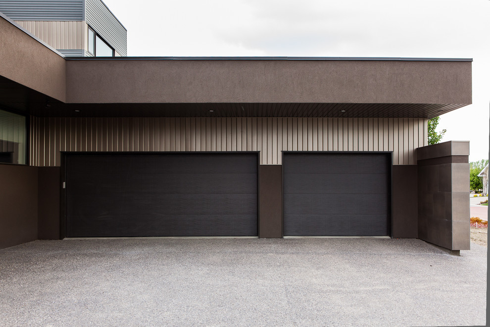 Photo of a modern attached two-car garage in Edmonton.