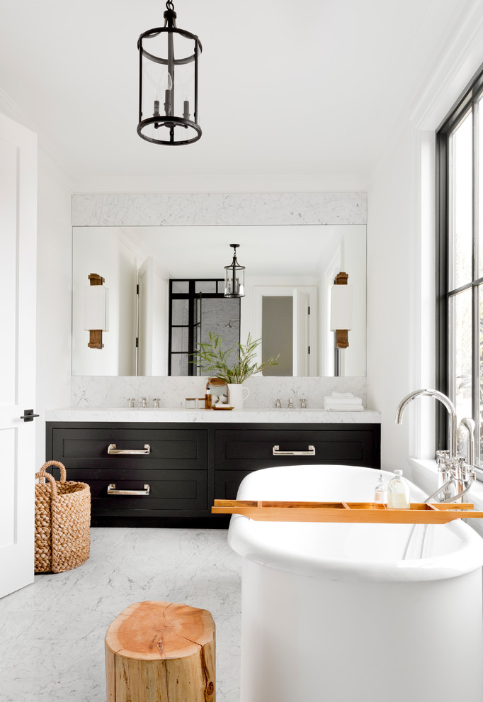 Design ideas for a large scandinavian master bathroom in New York with black cabinets, a freestanding tub, white walls, grey floor, an alcove shower, gray tile, white tile, stone slab, marble floors, an undermount sink, marble benchtops, a hinged shower door and shaker cabinets.