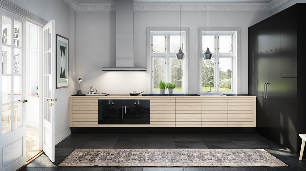 Inspiration for a large modern single-wall separate kitchen in Esbjerg with beaded inset cabinets, beige cabinets, no island, a drop-in sink, black appliances and ceramic floors.