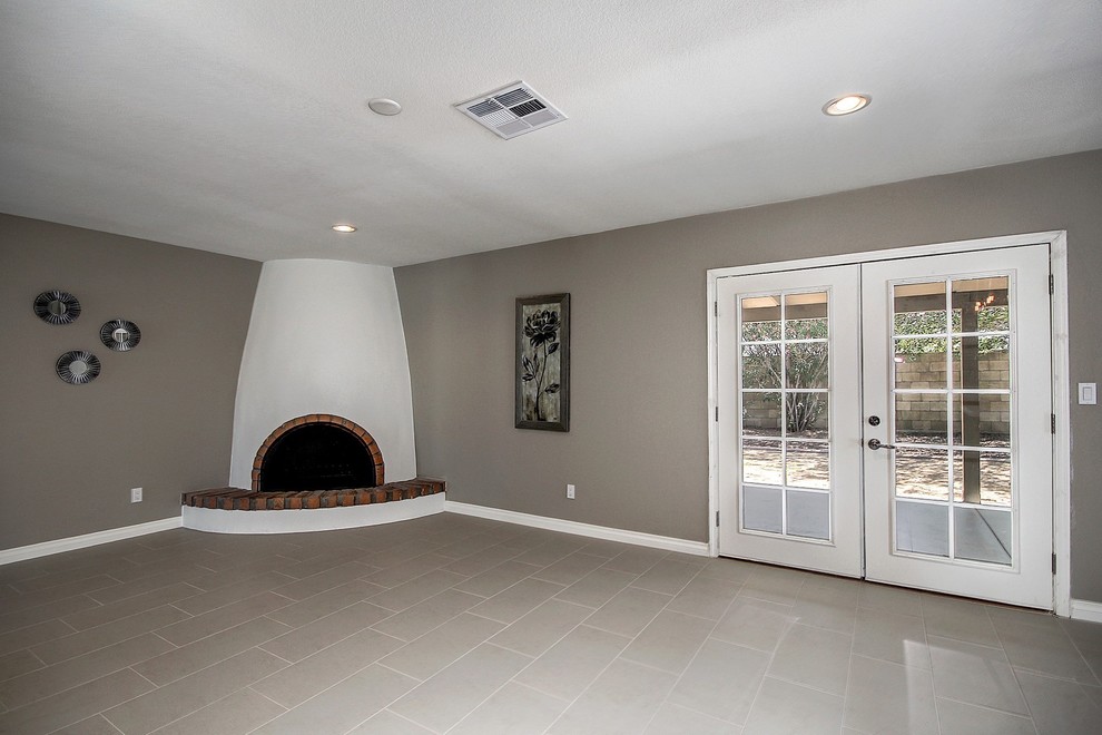 Example of a mountain style home design design in Phoenix