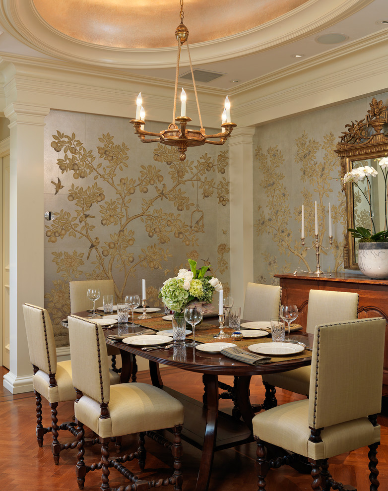 Photo of a traditional dining room in Boston with multi-coloured walls and medium hardwood floors.