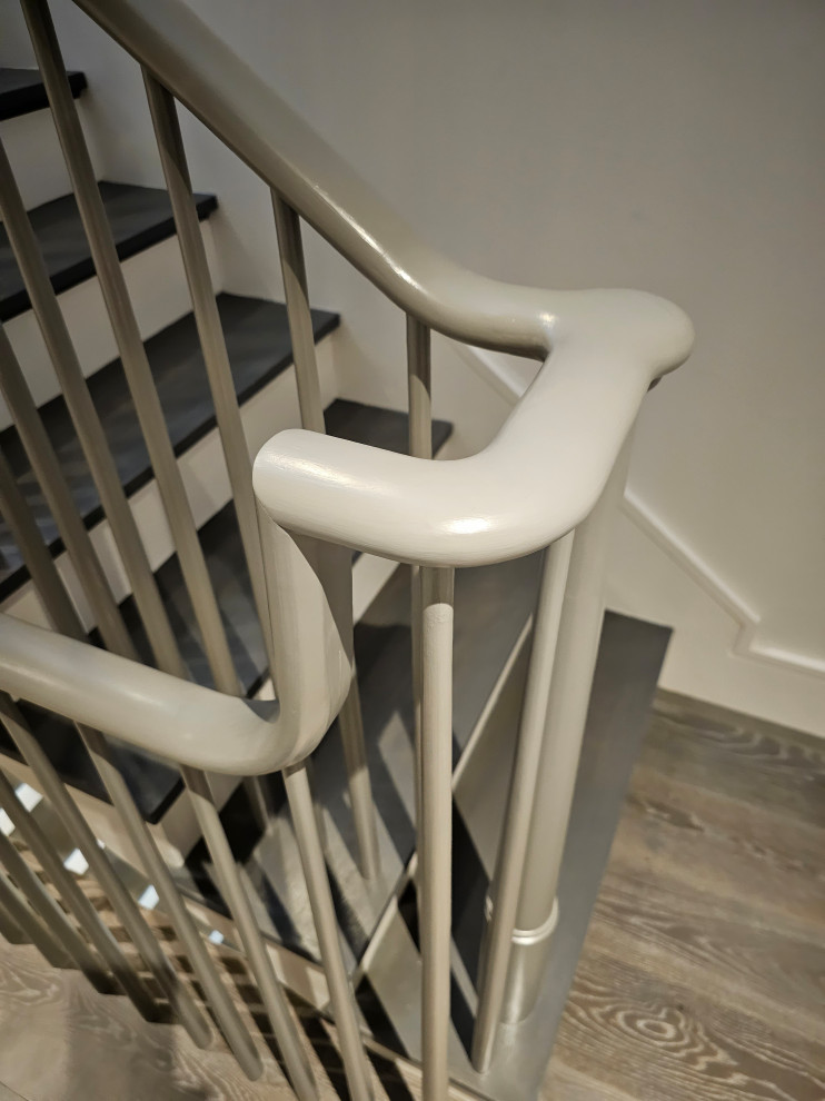 Staircase - huge transitional wooden straight wood railing staircase idea in DC Metro with painted risers